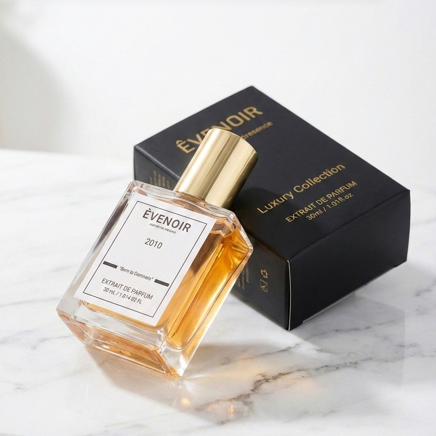 Luxury perfume bottle with gold cap and black box, 30ml extrait de parfum, on marble surface