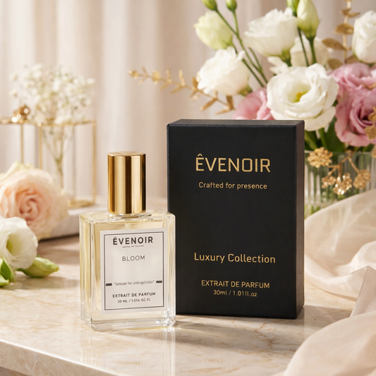 Bloom perfume 30ml Extrait de Parfum bottle and black luxury box on marble with flowers