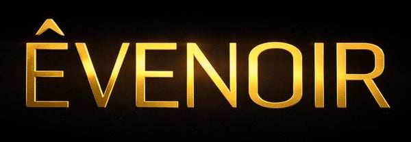Gold luxury serif text logo on black background with accent over first letter